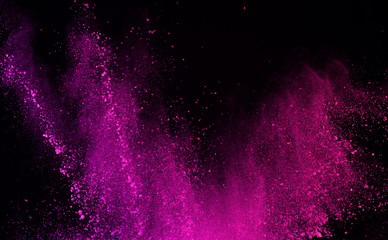 abstract pink powder splatted background,Freeze motion of color powder exploding/throwing color...