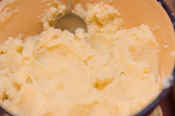 Smash potatoes. Make mashed potatoes. Cooking at home.