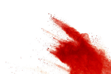 Red powder explosion on white background. Paint Holi.