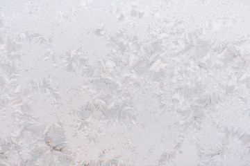 Background ice on the glass. Frost. The texture of frost. The glass is frozen.