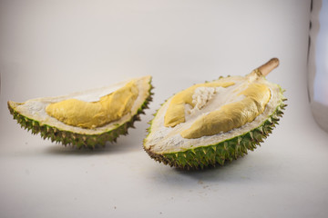 Fresh cut 2 piece of durian on a white background, king of fruit from Thailand
