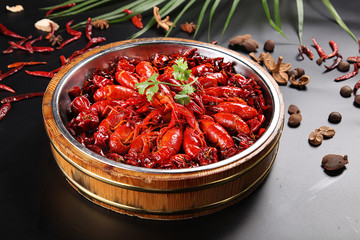 Spicy crayfish in wooden casks