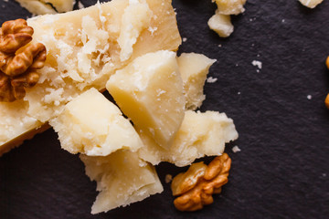 fragrant Parmesan on a slate stone slicing board
