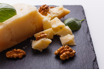 fragrant Parmesan on a slate stone slicing board