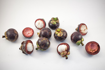Isolated mangosteens. Plenty fruits isolated on white background top view