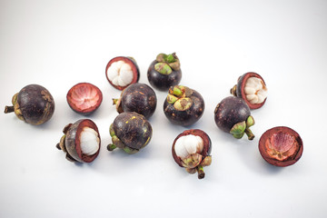 Isolated mangosteens. Plenty fruits isolated on white background top view