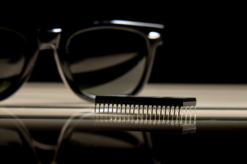 Microchip and black sunglasses