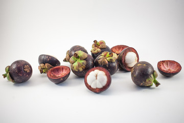 Isolated mangosteens. Plenty fruits isolated on white background top view
