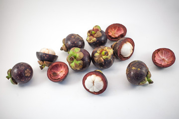 Isolated mangosteens. Plenty fruits isolated on white background top view