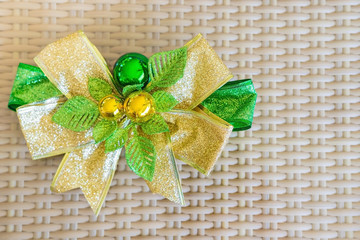 A green ribbon with small ball for decorate on rattan threshing