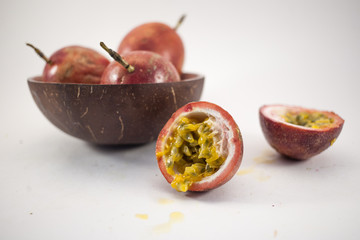 Passion fruit isolated. Whole passionfruit and a half of maracuya isolated on white background