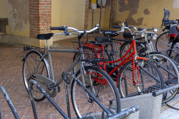 Fototapeta na wymiar Bicycles stand on bike rack
