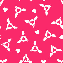 Flying funny hearts, glowing bulbs, wings. Seamless two-color vector pattern for Valentines day.