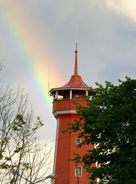 Rainbow over the ancient wooden fire tower