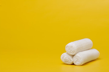 Plaster bandage roll and scissors