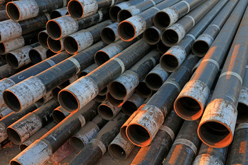 Mottled steel pipe pile up together in a factory