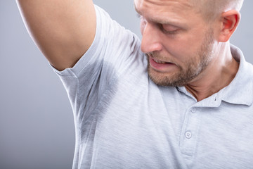 Man Sweating Badly Under Armpit