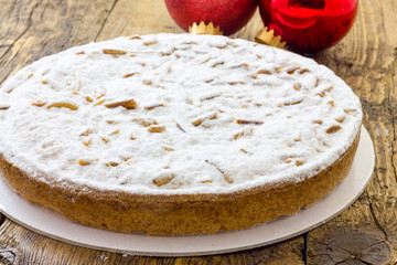 Cream cake with pine nuts