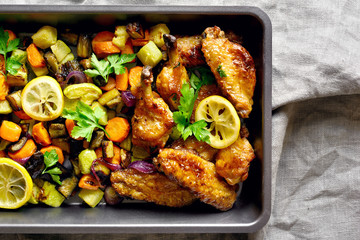 Roasted vegetables with chicken wings