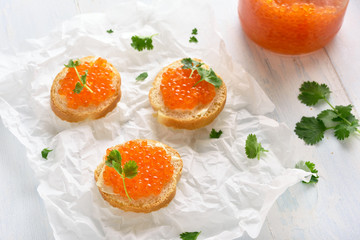 Sandwiches with red caviar