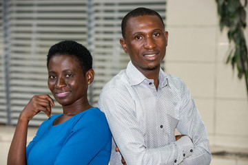 close up of young couple, smiling.