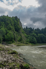 Fototapeta na wymiar Dark grey morning near Lesnicky creek and Dunajec river confluence