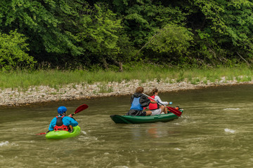 Fototapeta na wymiar Kayak boats on Dunajec river in Pieniny national park