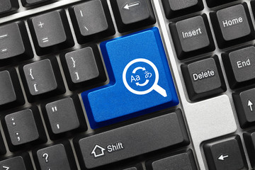 Conceptual keyboard - Search (blue key with loupe and translation symbols)