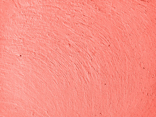 Trend photography on the theme of the actual colors for this season - a shade of orange.  Concrete orange light texture.