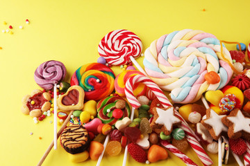 candies with jelly and sugar. colorful array of different childs sweets and treats.