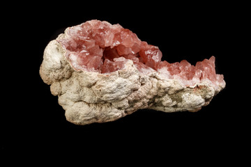 Macro mineral stone Pink Amethyst on a black background