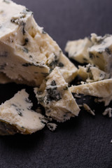 delicious blue cheese on wooden rustic background
