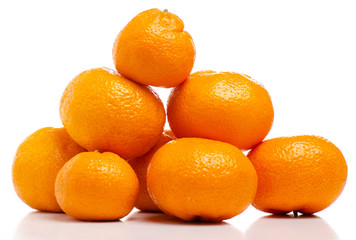 A pile of mandarin on a white background isolation.