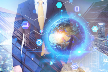 Businessman in city, internet icons