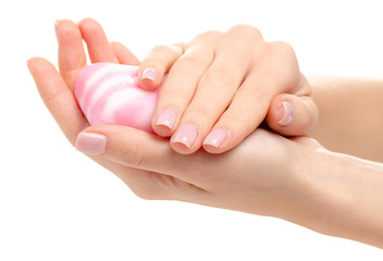 Pink white soap in hand on white background isolation