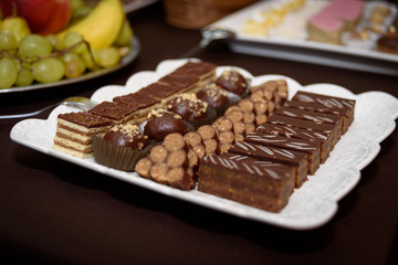 small chocolate cakes beautifully served on a plate