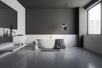 Concrete floor bathroom interior, tub and sink