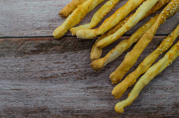 Salty crackers, tortilla chips and other savory snacks with salsa dip