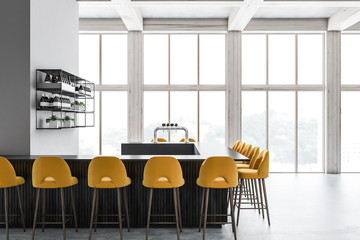 Loft bar interior, yellow stools