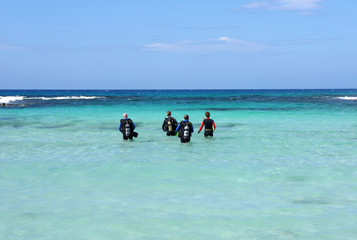 Divers. Nissi-Beach. Cyprus.