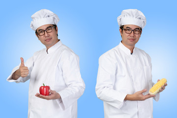 Asian chef wearing white suit with clean hat The hands are holding high quality red bell pepper and corn without preservatives. Contains antioxidants. It help to prevent and reduce the risk of cancer.