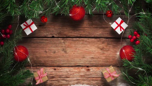 Christmas background, gifts and ornaments on  old wooden table