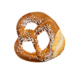 Pretzel with large salt crystals isolated on white