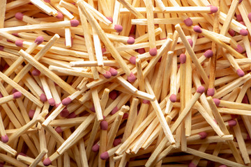Match sticks with brown heads in a row. Texture