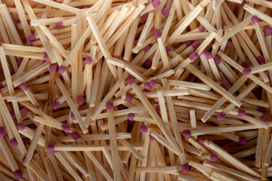 Match sticks with brown heads in a row. Texture
