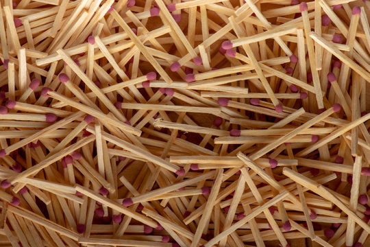 Match sticks with brown heads in a row. Texture
