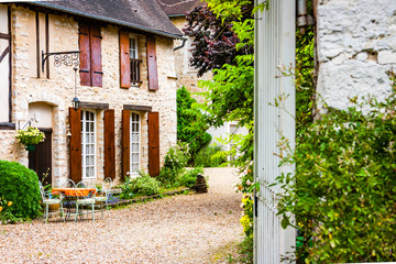 Quaint French farmhouse and garden - obrazy, fototapety, plakaty