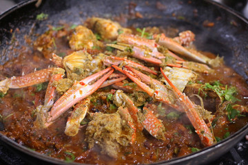 Fototapeta na wymiar crab curry in a pan