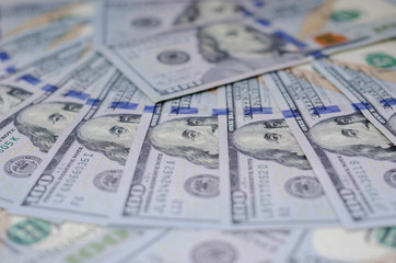 hundred dollar bills beautifully laid out