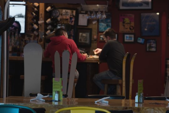 Friends enjoying their drinks in pub